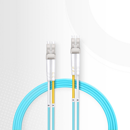 FyberOptix 10m (33ft) Fiber Patch Cable, 2 Fibers, LC UPC Duplex to LC UPC Duplex, Multimode (OM3), Riser (OFNR), 2.0mm, Tight-Buffered, Aqua